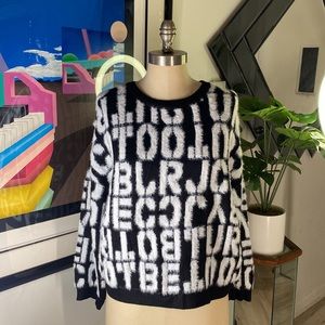 NEW black and white ultra soft and fluffy letter sweater NWT